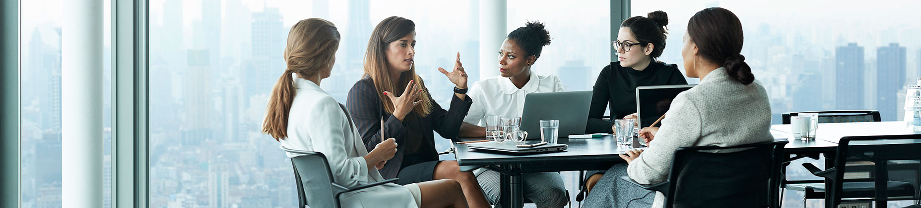 business-women-boardroom-skyline-view
