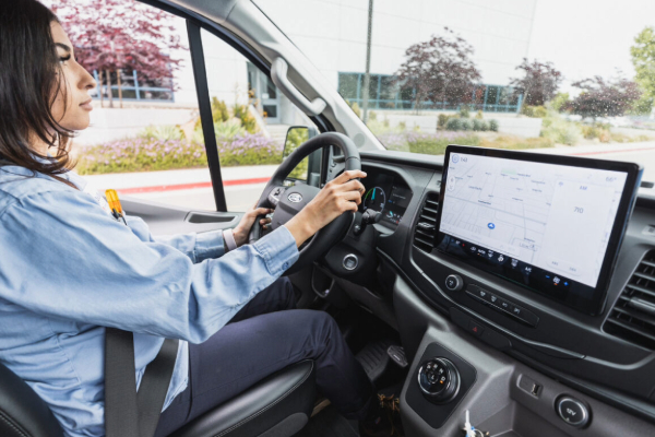 Female employee driving the new van