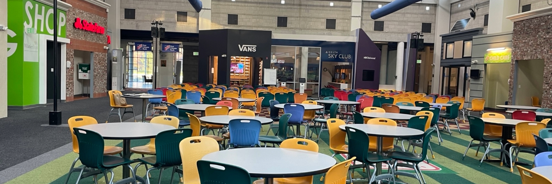 Childrens tables and chairs in a mall like setting