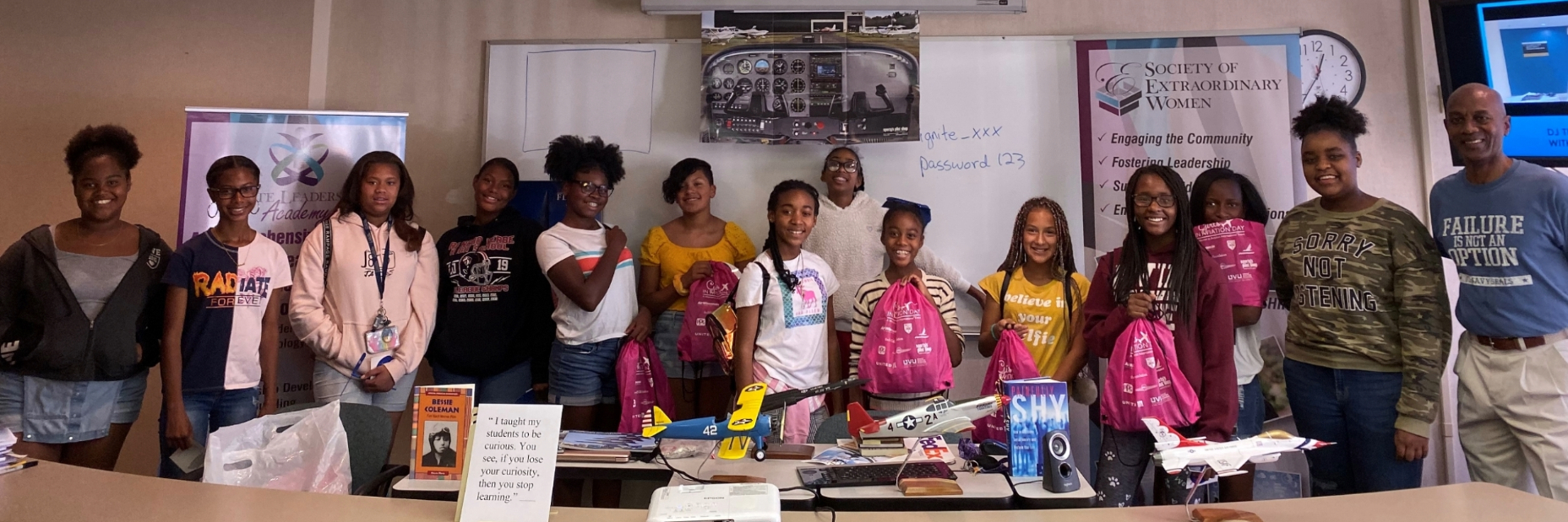 Students posing for a picture in a classroom