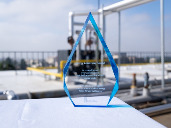 Image of award on table with boiler in the background