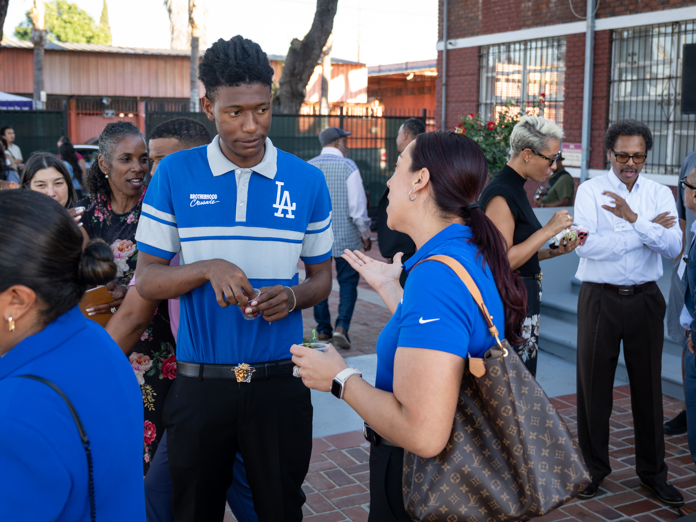Student and woman talking