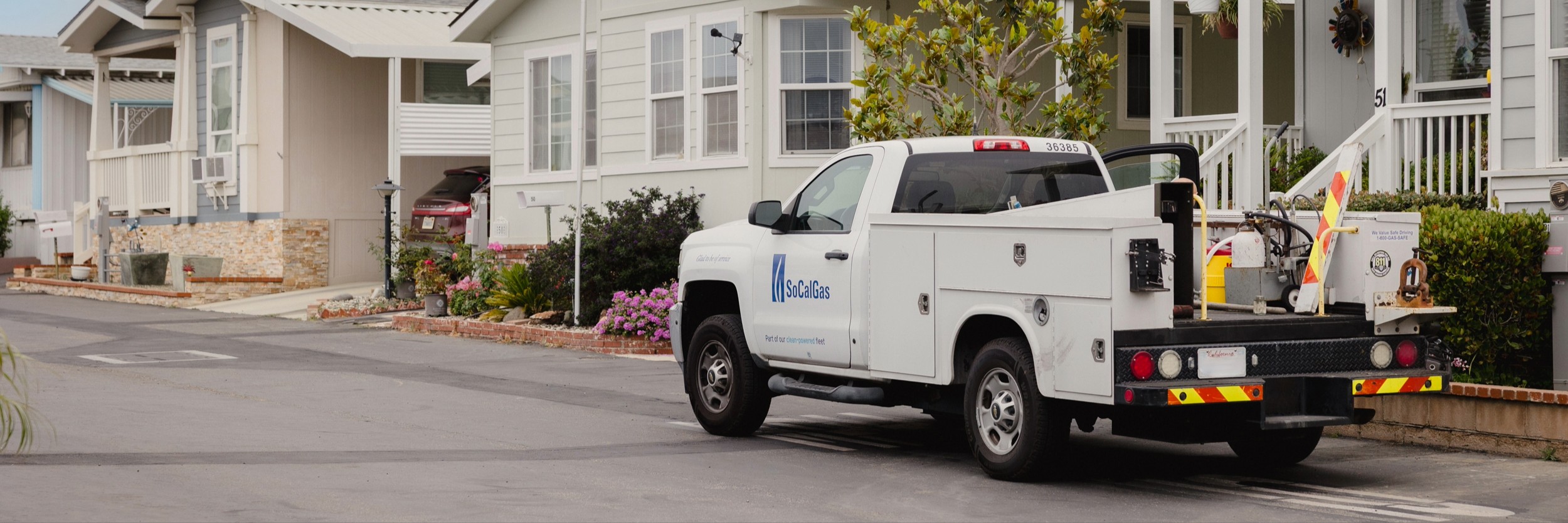 SoCalGas truck in front of mobilehomes. 