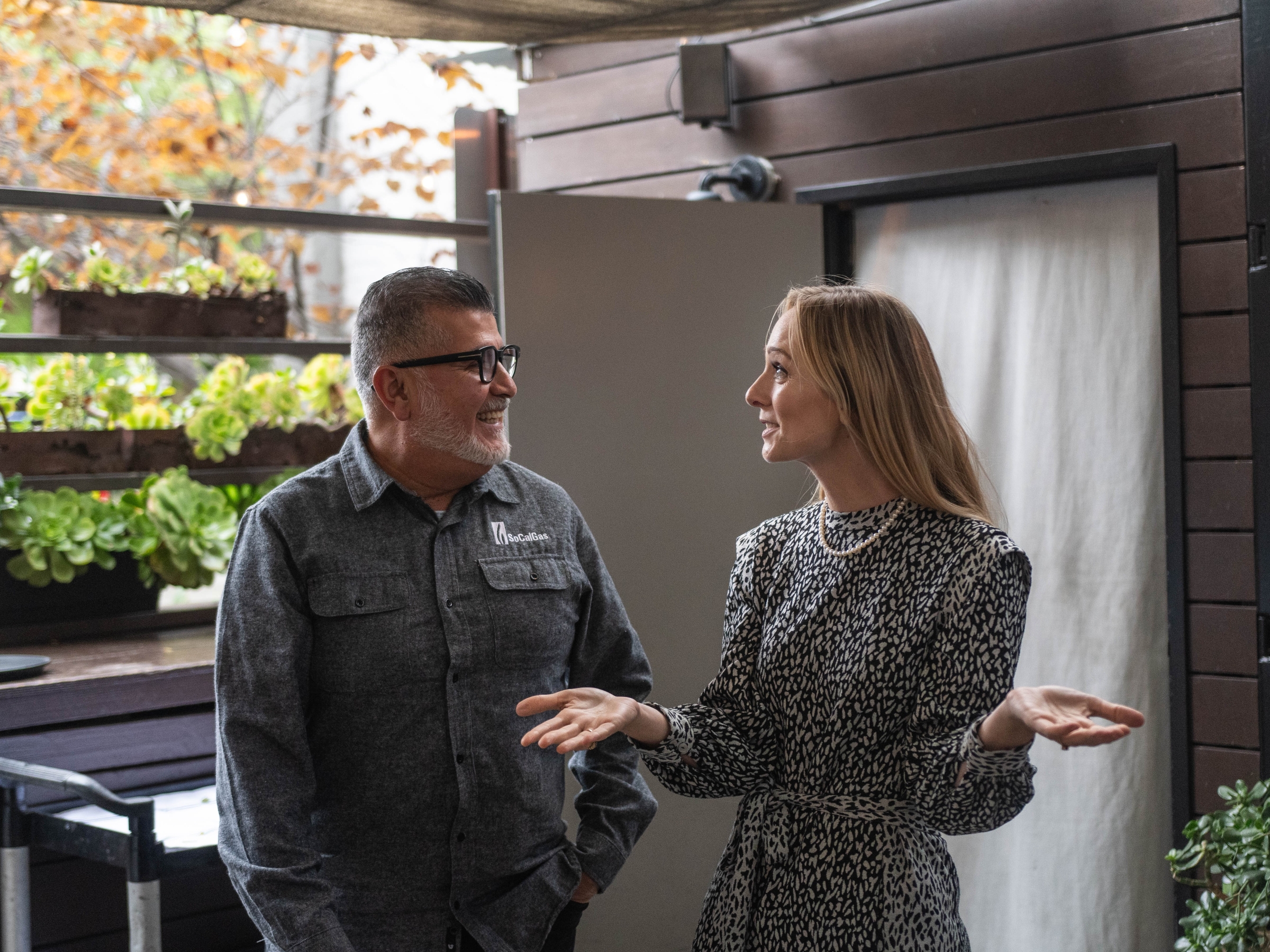 Two people laughing