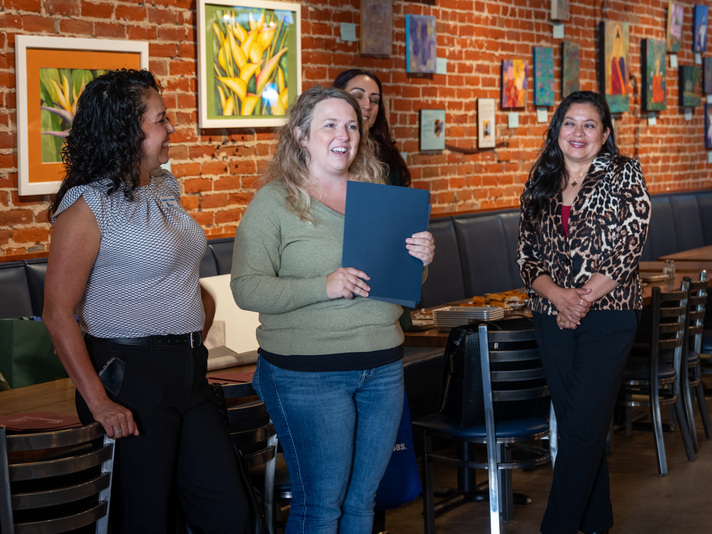 Group of people standing in restaurant