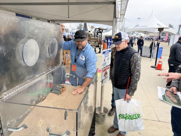 SoCalGas employee explaining the implications of not calling 811 before digging to a customer