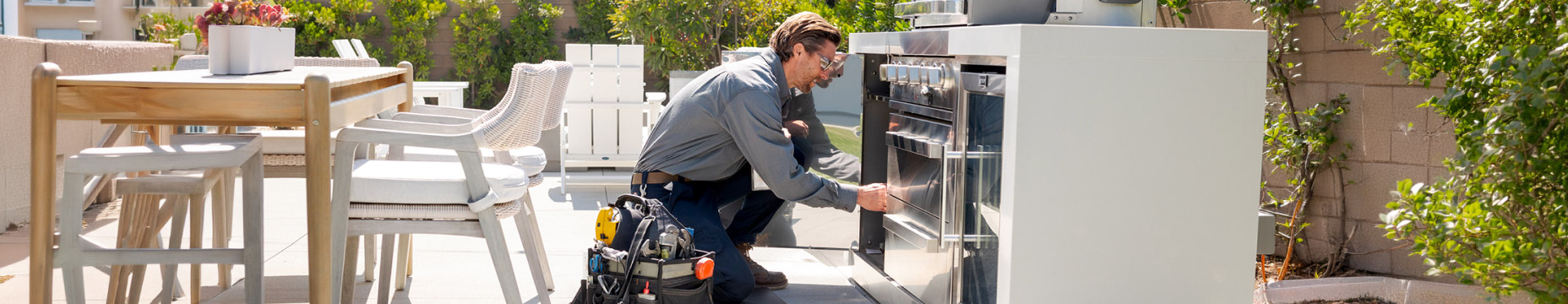 socalgas worker fixing BBQ