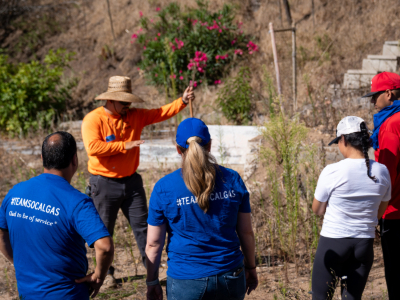 Group learning about what their clean up efforts will be at event
