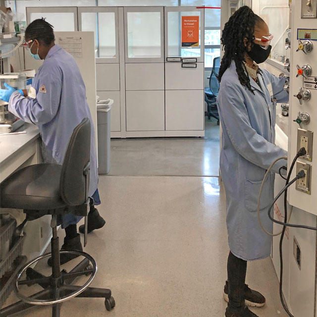 Researchers working in a lab