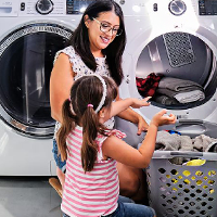 image of mom and daughter near washer and dryer