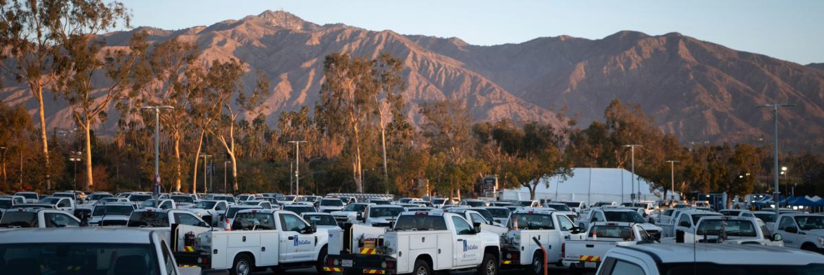 socalgas vehicles in a parking lot responding to the eaton fire