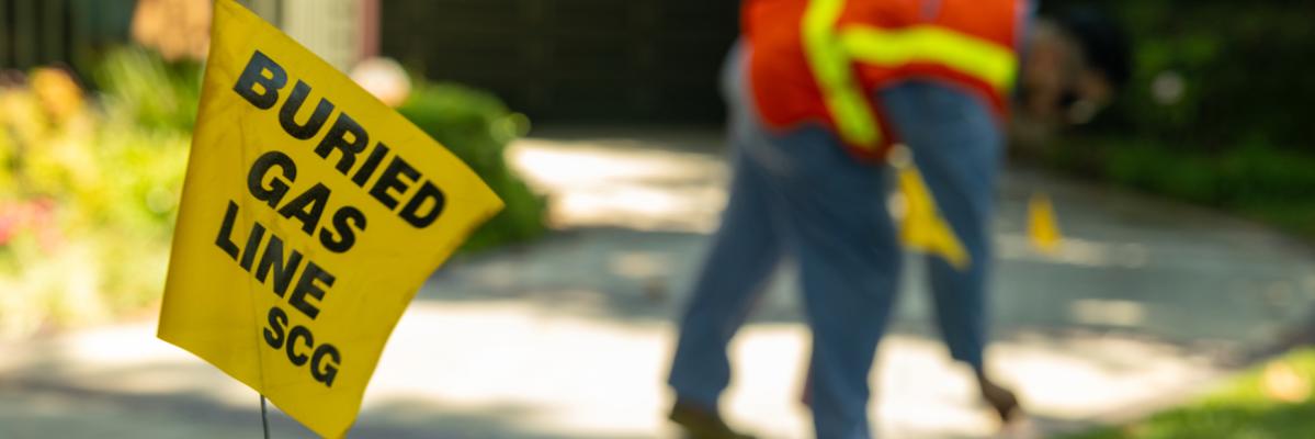 811 Day Images of Tech marking buried gas lines