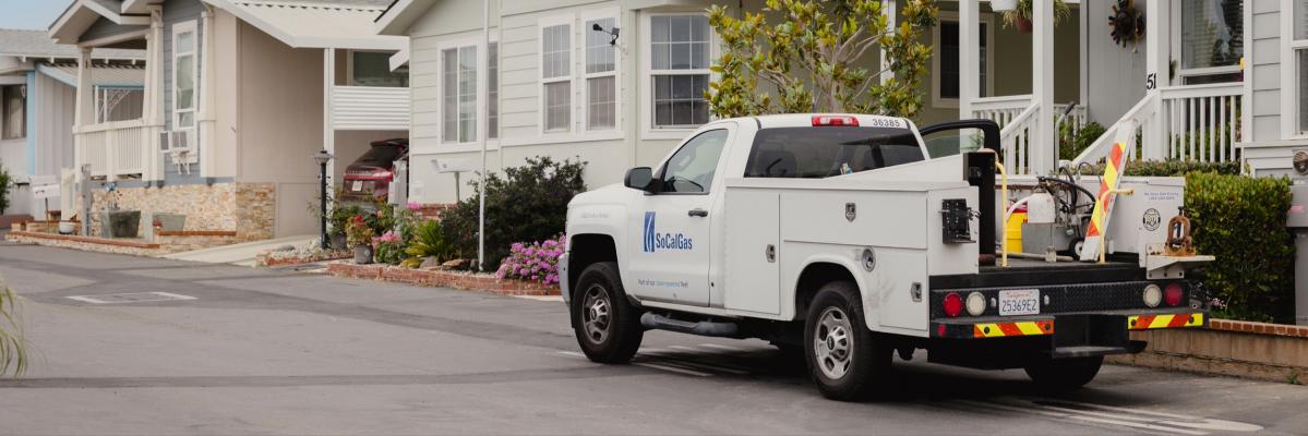 SoCalGas truck in front of mobilehomes