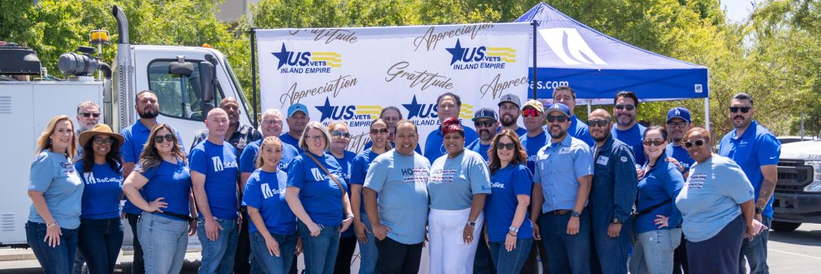 Group shot of socalgas volunteers at US Vets event for july 4th celebration