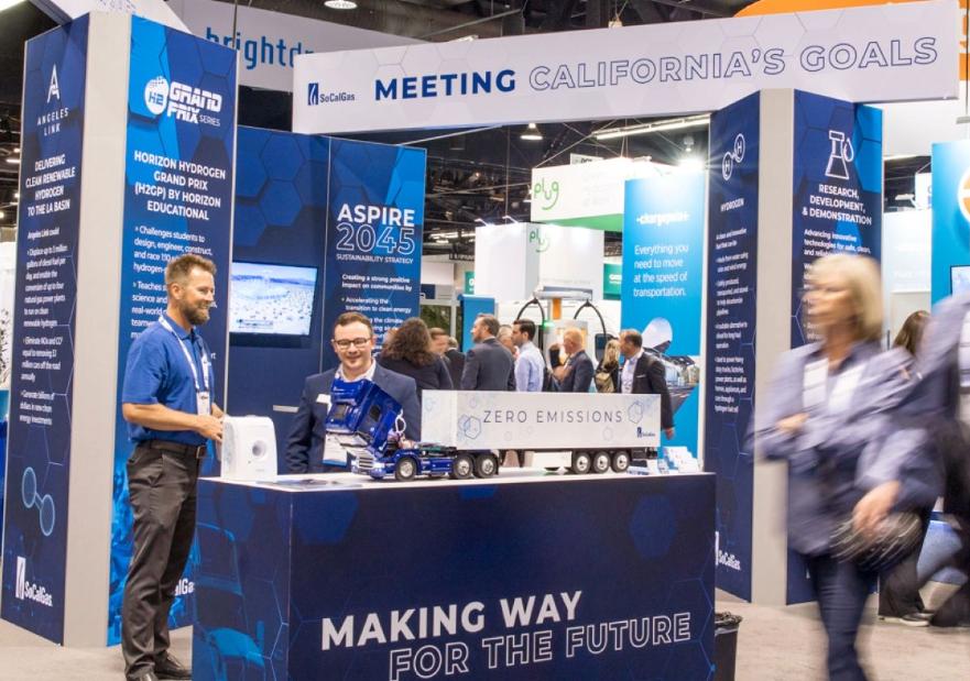 people viewing socalgas' booth at the act expo