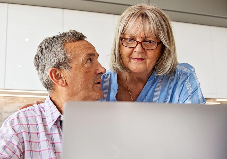 Couple Talking in Kitchen