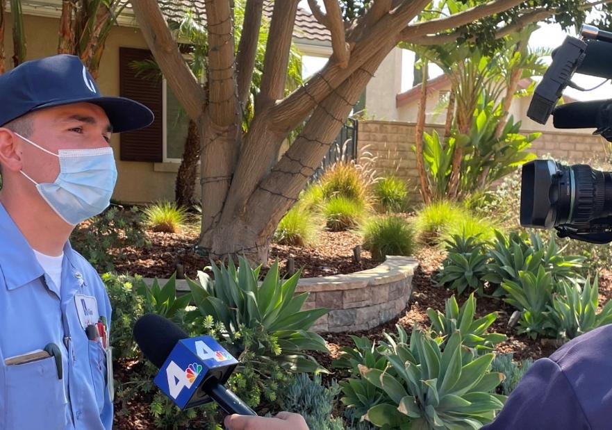 News reporter from NBC4 interviewing a socalgas employee