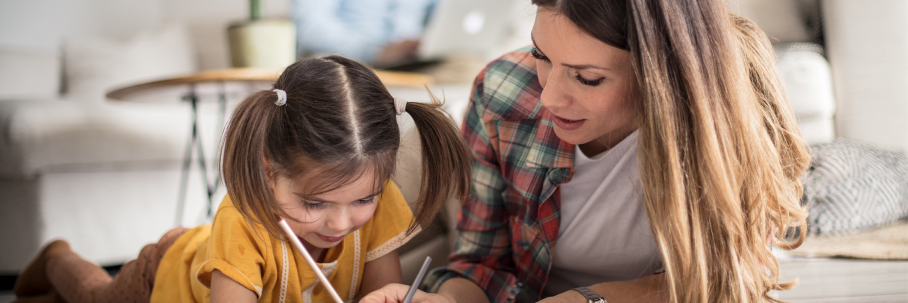 Woman Drawing with Daughter