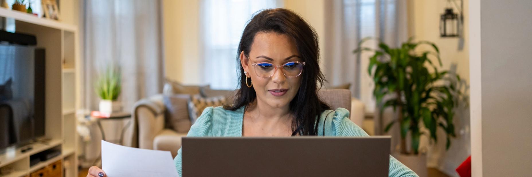 Woman Looking at Bill
