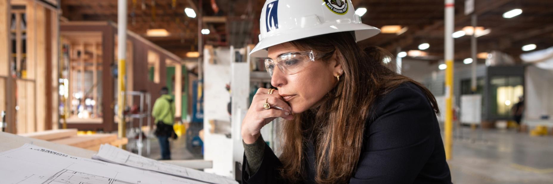 Maryam Brown Looking at Blueprints