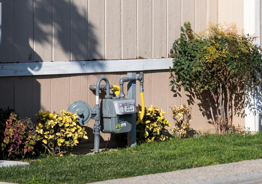 Side of a mobile home showing the gas meter