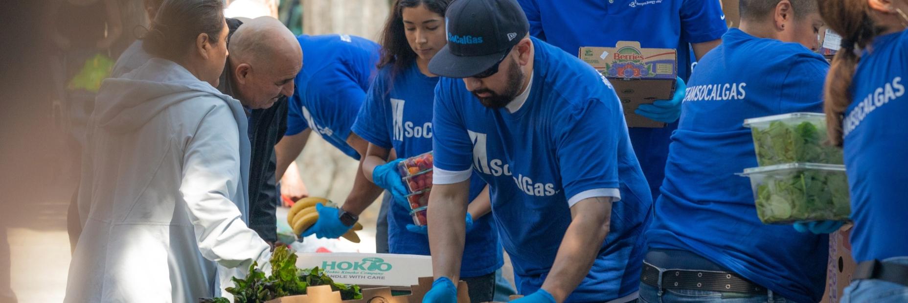 People organizing food at a food drive