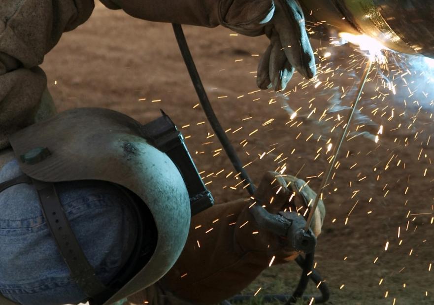 Workers welding