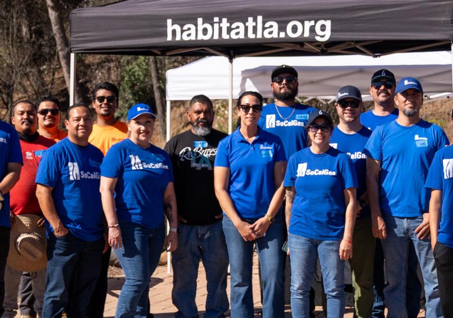 Group shot of socalgas volunteers and habitat for humanity on site in Malibu